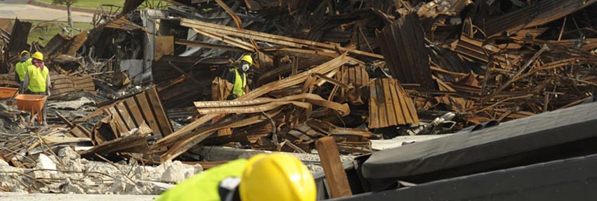 A kitchen that has been extensively damaged by a fire.